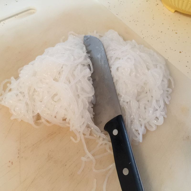 Cut noodles in half