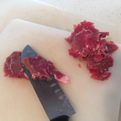 Some kind of sliced meat or ofal